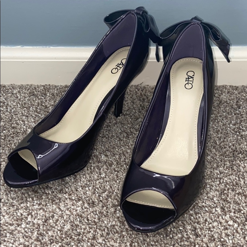 Purple heels with a bow at the back